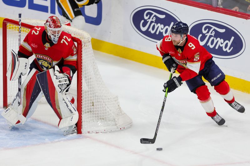 Dec 8, 2023; Sunrise, Florida, USA; Florida Panthers center Sam Bennett (9) moves the puck against the Pittsburgh Penguins during the third period at Amerant Bank Arena. Mandatory Credit: Sam Navarro-USA TODAY Sports