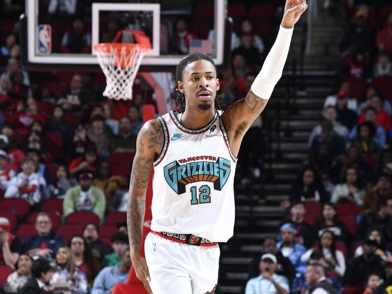 HOUSTON, TX - JANUARY 13:  Ja Morant #12 of the Memphis Grizzlies looks on during the game against the Houston Rockets  on January 13, 2025 at the Toyota Center in Houston, Texas. NOTE TO USER: User expressly acknowledges and agrees that, by downloading and or using this photograph, User is consenting to the terms and conditions of the Getty Images License Agreement. Mandatory Copyright Notice: Copyright 2024 NBAE (Photo by Logan Riely/NBAE via Getty Images)