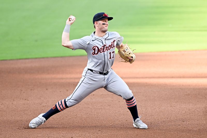 Sep 2, 2024; San Diego, California, USA; Detroit Tigers second baseman Jace Jung (17) throws out San Diego Padres third baseman Manny Machado (not pictured) at first base during the seventh inning at Petco Park. Mandatory Credit: Denis Poroy-USA TODAY Sports