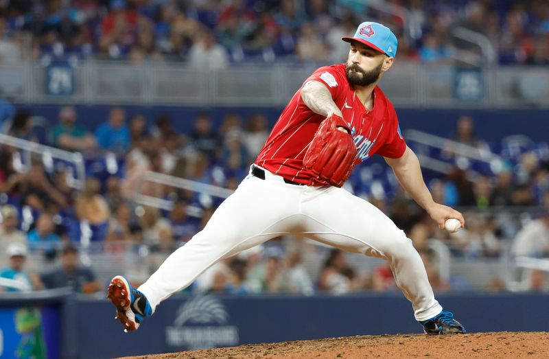 Jul 6, 2024; Miami, Florida, USA; Miami Marlins relief pitcher Tanner Scott (66) pitches against the Chicago White Sox during the ninth inning at loanDepot Park. Mandatory Credit: Rhona Wise-USA TODAY Sports