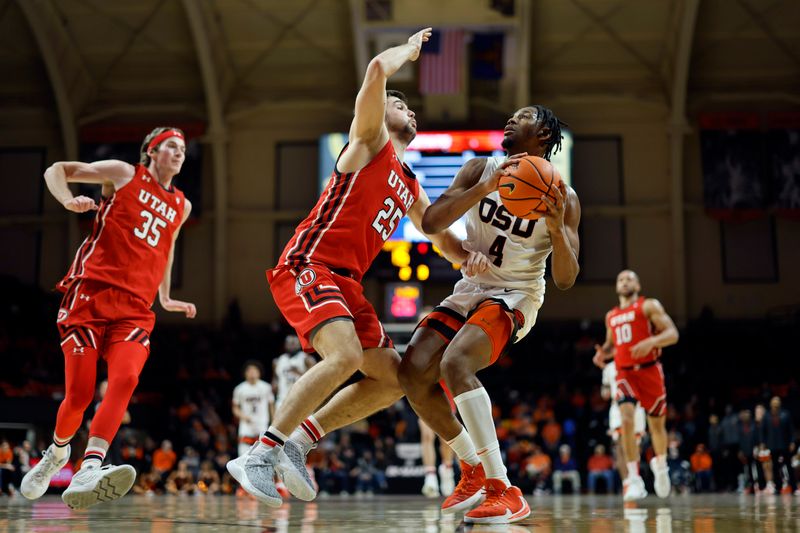 Jan 26, 2023; Corvallis, Oregon, USA; Oregon State Beavers guard Dexter Akanno (4) attempts to score as Utah Utes guard Rollie Worster (25) defends during the first half at Gill Coliseum. Mandatory Credit: Soobum Im-USA TODAY Sports