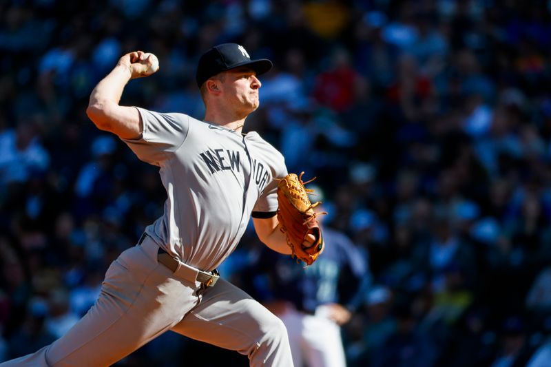 Sep 19, 2024; Seattle, Washington, USA; New York Yankees starting pitcher Clarke Schmidt (36) throws against the Seattle Mariners during the fifth inning at T-Mobile Park. Mandatory Credit: Joe Nicholson-Imagn Images