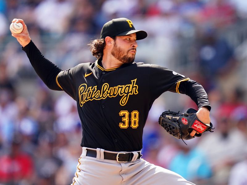 Sep 10, 2023; Cumberland, Georgia, USA; Pittsburgh Pirates relief pitcher Thomas Hatch (38) pitching against the Atlanta Braves during the eighth inning at Truist Park. Mandatory Credit: John David Mercer-USA TODAY Sports