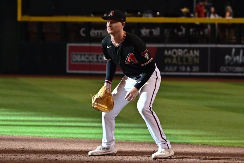 May 27, 2023; Phoenix, Arizona, USA;  Arizona Diamondbacks first baseman Pavin Smith (26) plays his position against the Boston Red Sox in the third inning at Chase Field. Mandatory Credit: Matt Kartozian-USA TODAY Sports