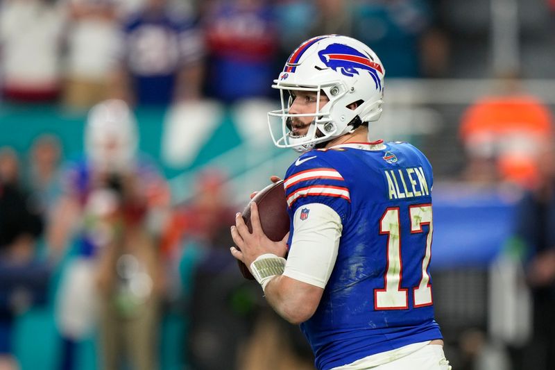 Buffalo Bills quarterback Josh Allen drops back to pass during the second half of an NFL football game against the Miami Dolphins, Sunday, Jan. 7, 2024, in Miami Gardens, Fla. (AP Photo/Wilfredo Lee)