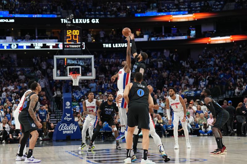 DALLAS, TX - APRIL 12: James Wiseman #13 of the Detroit Pistons and Daniel Gafford #21 of the Dallas Mavericks go up for the opening tip off on April 12, 2024 at the American Airlines Center in Dallas, Texas. NOTE TO USER: User expressly acknowledges and agrees that, by downloading and or using this photograph, User is consenting to the terms and conditions of the Getty Images License Agreement. Mandatory Copyright Notice: Copyright 2024 NBAE (Photo by Glenn James/NBAE via Getty Images)