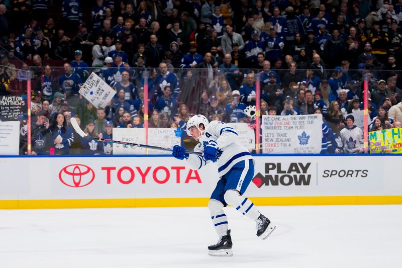 Jan 20, 2024; Vancouver, British Columbia, CAN; Toronto Maple Leafs forward Mitchell Marner (16) shoots during warm up prior to a game against the Vancouver Canucks at Rogers Arena.  Mandatory Credit: Bob Frid-USA TODAY Sports