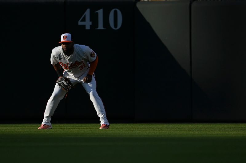 May 1, 2024; Baltimore, Maryland, USA;  Baltimore Orioles outfielder Cedric Mullins (31) stands in center field during the first inning against the New York Yankees at Oriole Park at Camden Yards. Mandatory Credit: Tommy Gilligan-USA TODAY Sports