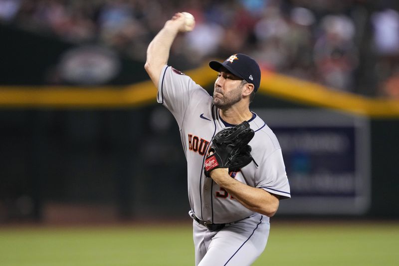 Sep 30, 2023; Phoenix, Arizona, USA; Houston Astros starting pitcher Justin Verlander (35) pitches against the Arizona Diamondbacks during the first inning at Chase Field. Mandatory Credit: Joe Camporeale-USA TODAY Sports