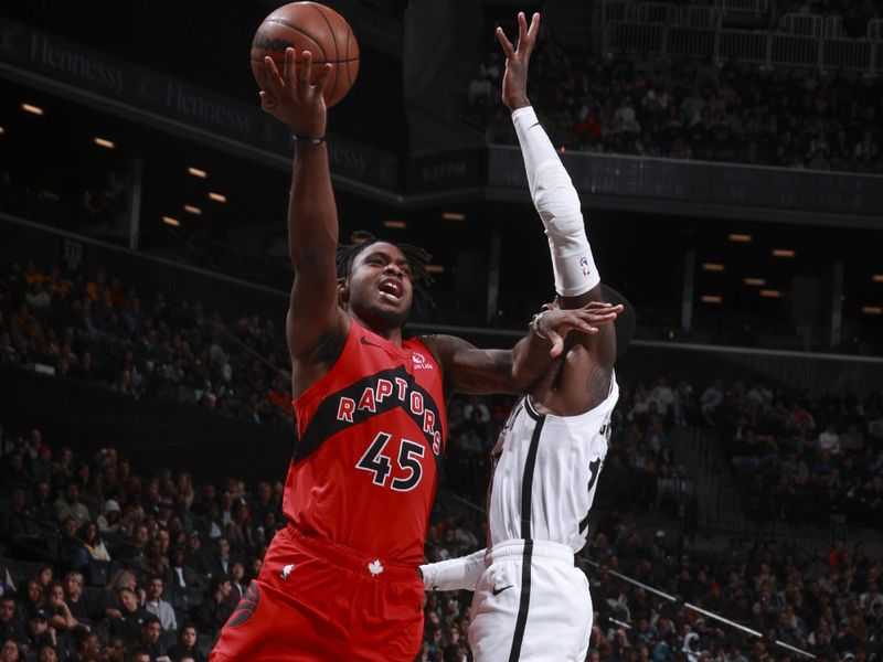 BROOKLYN, NY - OCTOBER 18: Davion Mitchell #45 of the Toronto Raptors shoots the ball during the game on October 18, 2024 at Barclays Center in Brooklyn, New York. NOTE TO USER: User expressly acknowledges and agrees that, by downloading and or using this Photograph, user is consenting to the terms and conditions of the Getty Images License Agreement. Mandatory Copyright Notice: Copyright 2024 NBAE (Photo by Nathaniel S. Butler/NBAE via Getty Images)