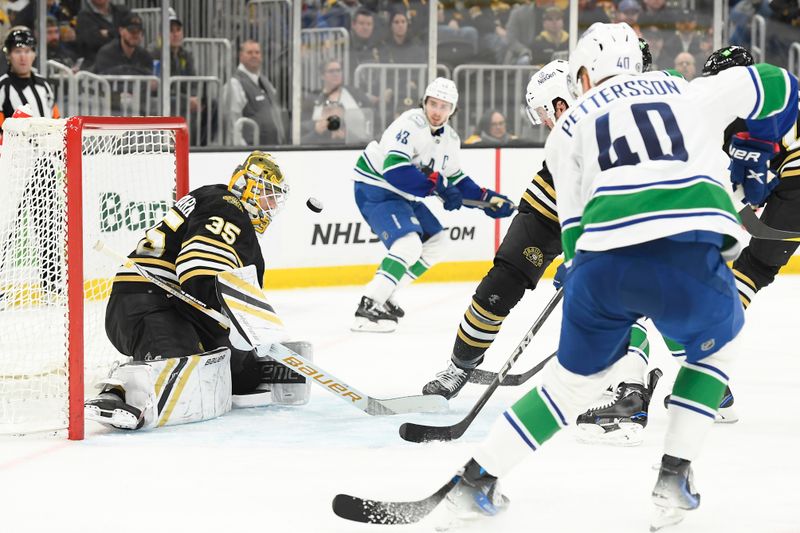 Feb 8, 2024; Boston, Massachusetts, USA; Boston Bruins goaltender Linus Ullmark (35) makes a save during the second period against the Vancouver Canucks at TD Garden. Mandatory Credit: Bob DeChiara-USA TODAY Sports