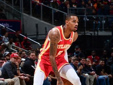 ATLANTA, GA - DECEMBER 18: Dejounte Murray #5 of the Atlanta Hawks handles the ball during the game  on December 18, 2023 at State Farm Arena in Atlanta, Georgia.  NOTE TO USER: User expressly acknowledges and agrees that, by downloading and/or using this Photograph, user is consenting to the terms and conditions of the Getty Images License Agreement. Mandatory Copyright Notice: Copyright 2023 NBAE (Photo by Scott Cunningham/NBAE via Getty Images)