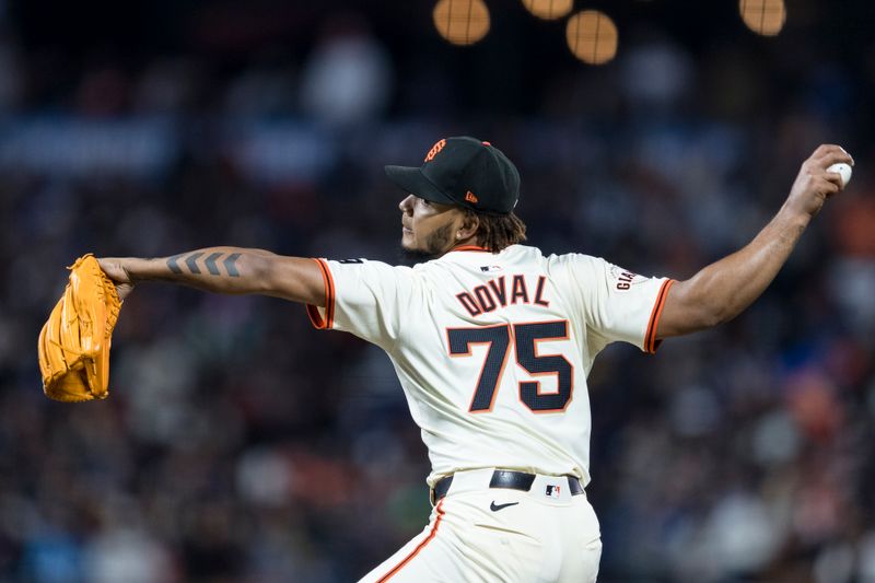 May 15, 2024; San Francisco, California, USA; San Francisco Giants closing pitcher Camilo Doval (75) throws against the Los Angeles Dodgers during the ninth inning at Oracle Park. Mandatory Credit: John Hefti-USA TODAY Sports