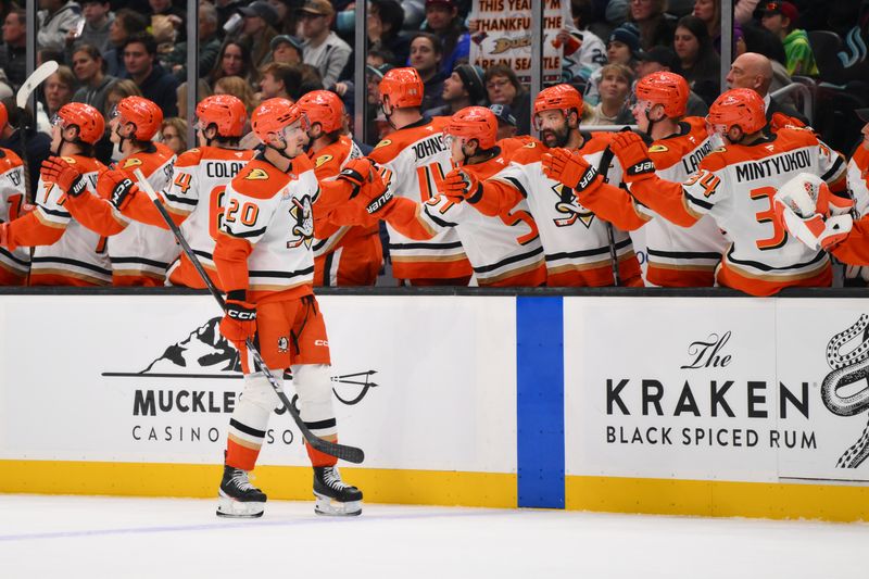 Nov 27, 2024; Seattle, Washington, USA; Anaheim Ducks right wing Brett Leason (20) celebrates with the bench after scoring a goal against the Seattle Kraken during the first period at Climate Pledge Arena. Mandatory Credit: Steven Bisig-Imagn Images