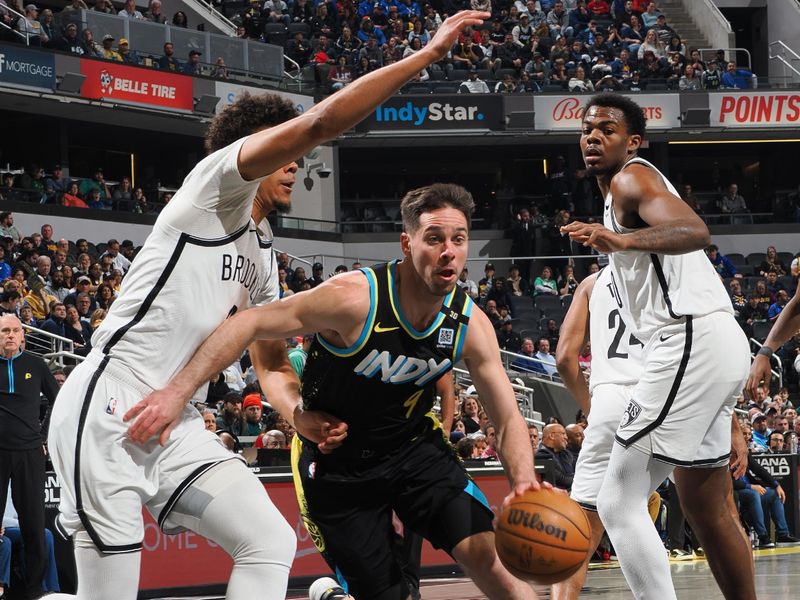 INDIANAPOLIS, IN - MARCH 16: T.J. McConnell #9 of the Indiana Pacers drives to the basket during the game against the Brooklyn Nets on March 16, 2024 at Gainbridge Fieldhouse in Indianapolis, Indiana. NOTE TO USER: User expressly acknowledges and agrees that, by downloading and or using this Photograph, user is consenting to the terms and conditions of the Getty Images License Agreement. Mandatory Copyright Notice: Copyright 2024 NBAE (Photo by Ron Hoskins/NBAE via Getty Images)