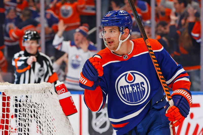 Feb 23, 2024; Edmonton, Alberta, CAN; Edmonton Oilers forward Zach Hyman (18) celebrates after scoring a goal during the third period against the Minnesota Wild at Rogers Place. Mandatory Credit: Perry Nelson-USA TODAY Sports