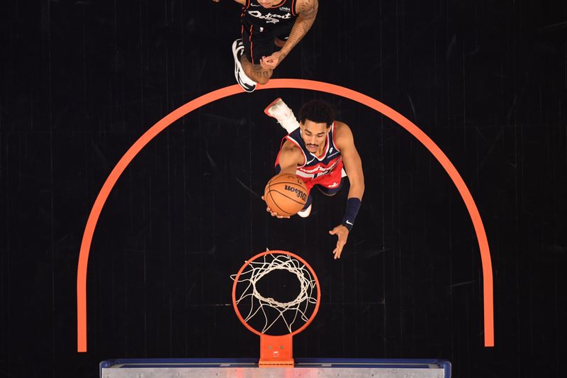 DETROIT, MI - JANUARY 27: Jordan Poole #13 of the Washington Wizards drives to the basket during the game against the Detroit Pistons on January 27, 2024 at Little Caesars Arena in Detroit, Michigan. NOTE TO USER: User expressly acknowledges and agrees that, by downloading and/or using this photograph, User is consenting to the terms and conditions of the Getty Images License Agreement. Mandatory Copyright Notice: Copyright 2024 NBAE (Photo by Chris Schwegler/NBAE via Getty Images)