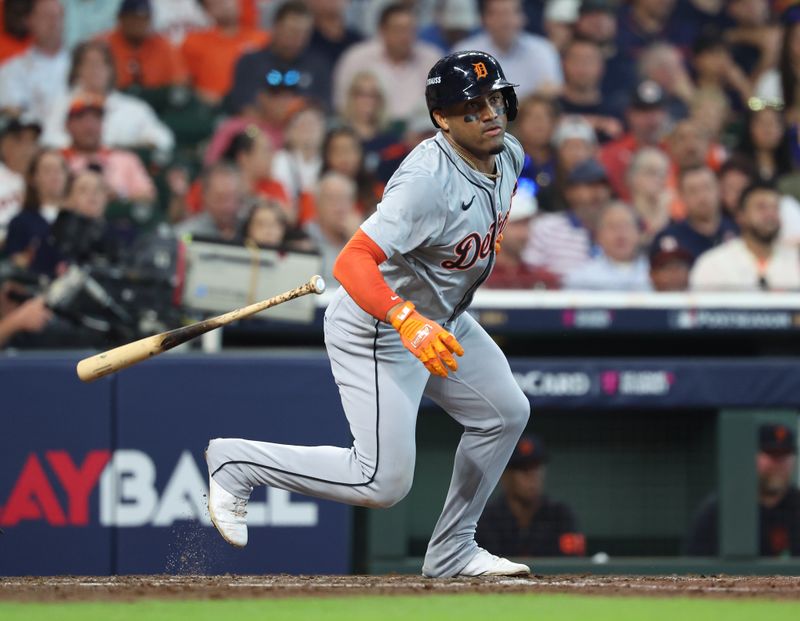 Oct 1, 2024; Houston, Texas, USA; Detroit Tigers second base Andy Ibanez (77) hits a double in the third inning against the Houston Astros in game one of the Wild Card round for the 2024 MLB Playoffs at Minute Maid Park. Mandatory Credit: Troy Taormina-Imagn Images