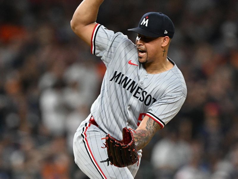 Jun 27, 2025; Detroit, Michigan, USA; Minnesota Twins relief pitcher Jhoan Duran (59) reacts after striking out Detroit Tigers center fielder Parker Meadows (not pictured) to end the game at Comerica Park. Mandatory Credit: Lon Horwedel-Imagn Images
