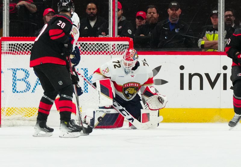 Mar 14, 2024; Raleigh, North Carolina, USA; Florida Panthers goaltender Sergei Bobrovsky (72) makes save against the Carolina Hurricanes during the second period at PNC Arena. Mandatory Credit: James Guillory-USA TODAY Sports