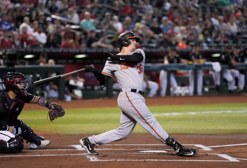 Sep 3, 2023; Phoenix, Arizona, USA; Baltimore Orioles catcher Adley Rutschman (35) bats against the Arizona Diamondbacks at Chase Field. Mandatory Credit: Joe Camporeale-USA TODAY Sports