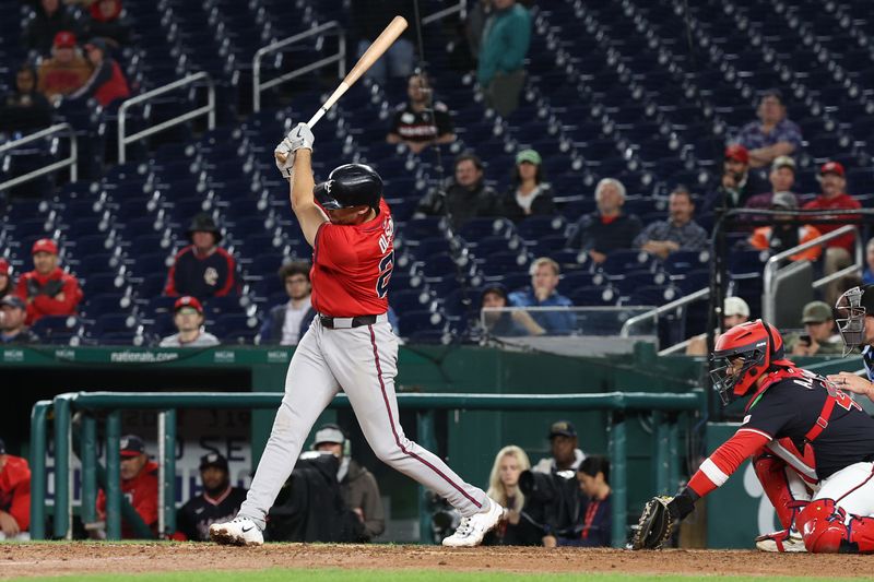 Sep 16, 2025; Washington, District of Columbia, USA; Atlanta Braves first base Matt Olson (28) hits a three run triple against the Washington Nationals during the tenth inning at Nationals Park. Mandatory Credit: Geoff Burke-Imagn Images