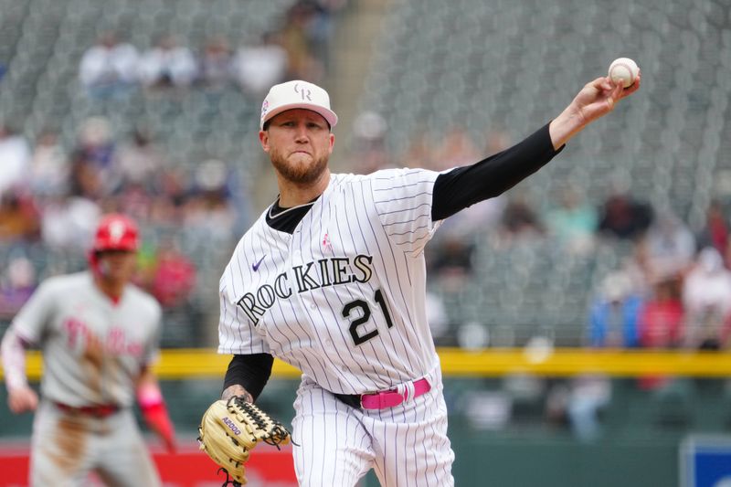 May 14, 2023; Denver, Colorado, USA; Colorado Rockies starting pitcher Kyle Freeland (21) delivers a pitch in the first inning against the Philadelphia Phillies at Coors Field. Mandatory Credit: Ron Chenoy-USA TODAY Sports