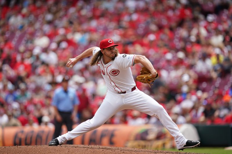 Jun 29, 2025; Cincinnati, Ohio, USA; Cincinnati Reds pitcher Scott Barlow (58) throws a pitch in the sixth inning against the San Diego Padres at Great American Ball Park. Mandatory Credit: Frank Bowen IV/ The USAToday Network via Imagn Images