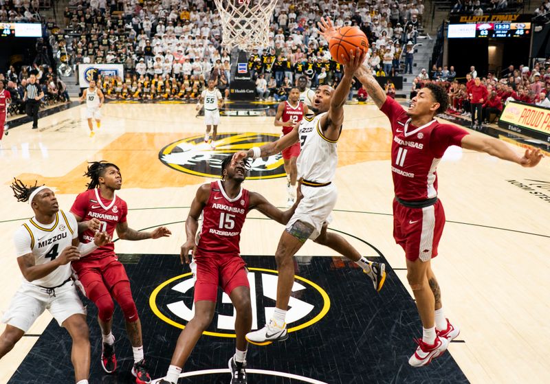 Jan 31, 2024; Columbia, Missouri, USA; Missouri Tigers guard Tamar Bates (2) shoots against the Arkansas Razorbacks during the second half at Mizzou Arena. Mandatory Credit: Jay Biggerstaff-USA TODAY Sports