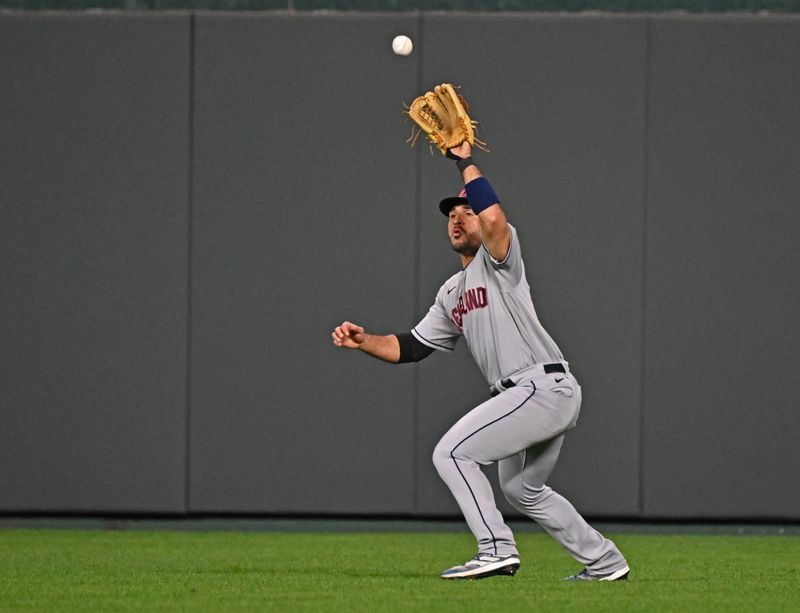 Sep 19, 2023; Kansas City, Missouri, USA; Cleveland Guardians right fielder Ramon Laureano (10) catches a fly ball in the fifth inning against the Kansas City Royals at Kauffman Stadium. Mandatory Credit: Peter Aiken-USA TODAY Sports