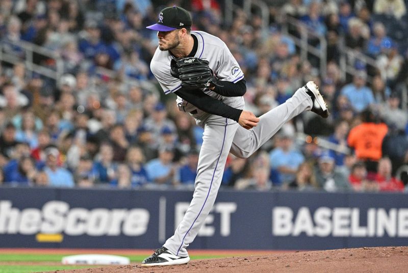 Apr 13, 2024; Toronto, Ontario, CAN;  Colorado Rockies starting pitcher Dakota Hudson (32) delivers a pitch against the Toronto Blue Jays in the first inning at Rogers Centre. Mandatory Credit: Dan Hamilton-USA TODAY Sports