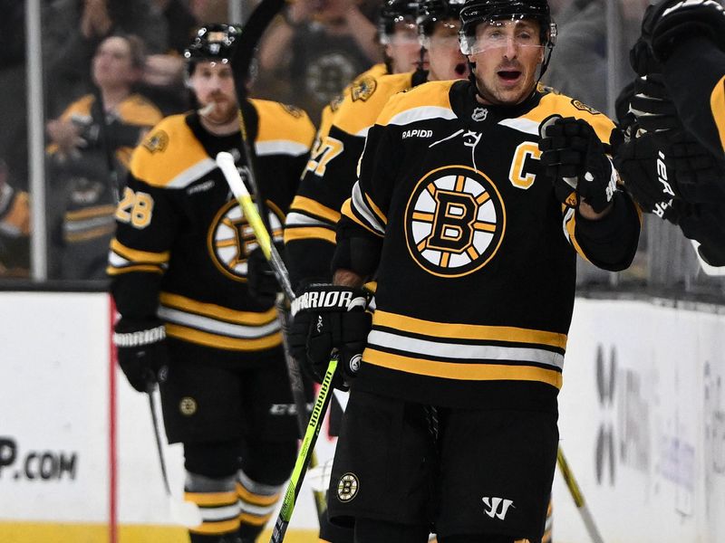 Nov 9, 2024; Boston, Massachusetts, USA; Boston Bruins left wing Brad Marchand (63) celebrates with his teammates after a goal against the Ottawa Senators during the second period at TD Garden. Mandatory Credit: Brian Fluharty-Imagn Images