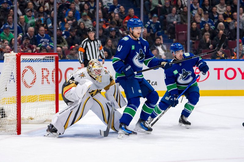 Apr 8, 2024; Vancouver, British Columbia, CAN; Vancouver Canucks forward Elias Pettersson (40) and forward Conor Garland (8) battle with Vegas Golden Knights goalie Logan Thompson (36) in the first period at Rogers Arena. Mandatory Credit: Bob Frid-USA TODAY Sports