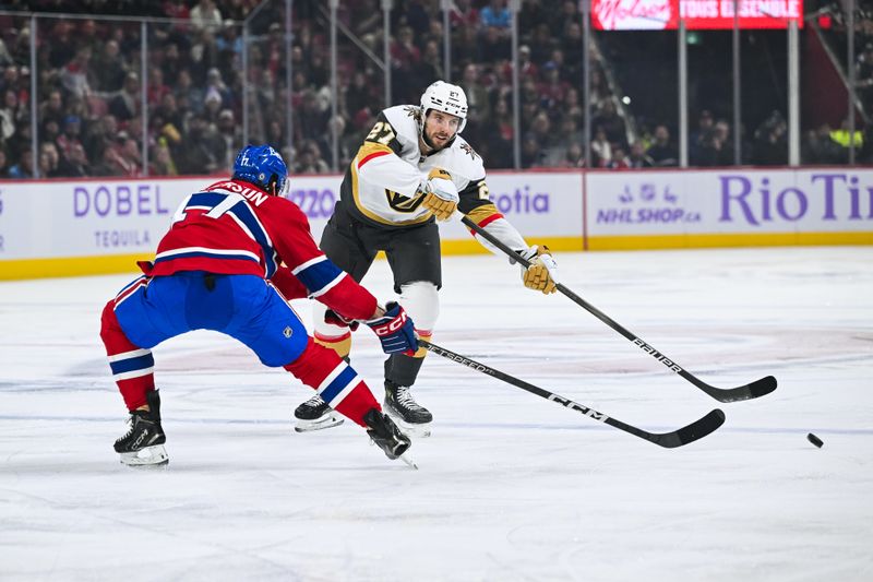 Nov 23, 2024; Montreal, Quebec, CAN; Las Vegas Golden Knights defenseman Shea Theodore (27) plays the puck against Montreal Canadiens right wing Josh Anderson (17) during the first period at Bell Centre. Mandatory Credit: David Kirouac-Imagn Images