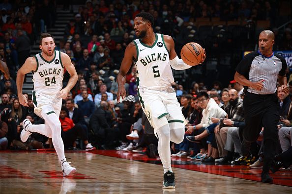 TORONTO, CANADA - NOVEMBER 15:  Malik Beasley #5 of the Milwaukee Bucks dribbles the ball during the game against the Toronto Raptors on November 15, 2023 at the Scotiabank Arena in Toronto, Ontario, Canada.  NOTE TO USER: User expressly acknowledges and agrees that, by downloading and or using this Photograph, user is consenting to the terms and conditions of the Getty Images License Agreement.  Mandatory Copyright Notice: Copyright 2023 NBAE (Photo by Vaughn Ridley/NBAE via Getty Images)