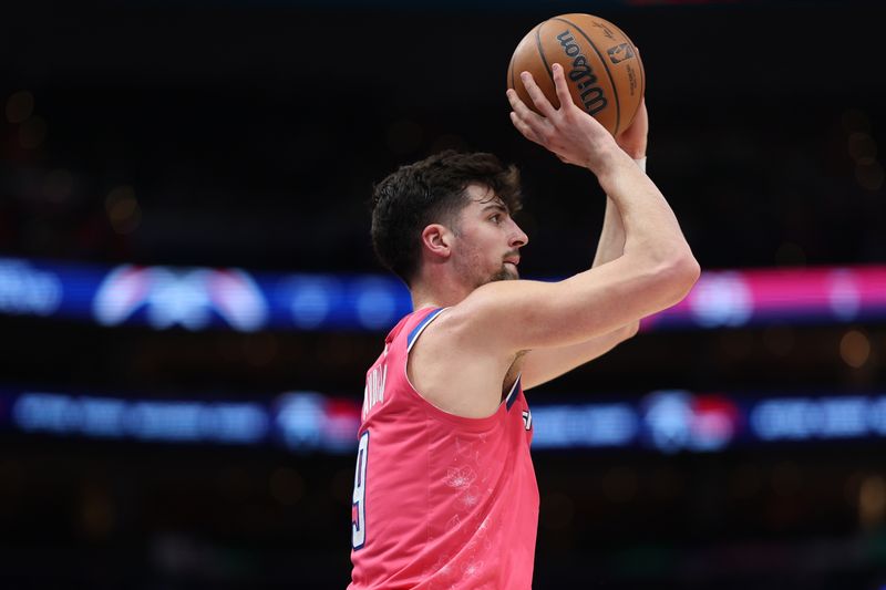 WASHINGTON, DC - MARCH 24: Deni Avdija #9 of the Washington Wizards shoots against the San Antonio Spurs during the second half at Capital One Arena on March 24, 2023 in Washington, DC. NOTE TO USER: User expressly acknowledges and agrees that, by downloading and or using this photograph, User is consenting to the terms and conditions of the Getty Images License Agreement.  (Photo by Patrick Smith/Getty Images)