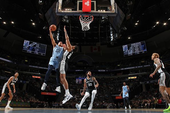 MEMPHIS, TN - JANUARY 2:  Desmond Bane #22 of the Memphis Grizzlies goes to the basket during the game on January 2, 2024 at FedExForum in Memphis, Tennessee. NOTE TO USER: User expressly acknowledges and agrees that, by downloading and or using this photograph, User is consenting to the terms and conditions of the Getty Images License Agreement. Mandatory Copyright Notice: Copyright 2024 NBAE (Photo by Joe Murphy/NBAE via Getty Images)