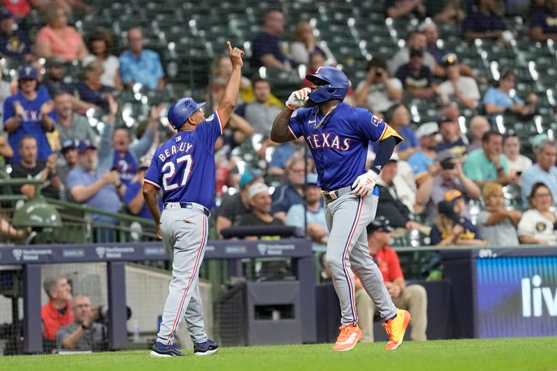 Jun 24, 2024; Milwaukee, Wisconsin, USA;  Texas Rangers right fielder Adolis Garcia (53) rounds the bases after hitting a home run during the sixth inning against the Milwaukee Brewers at American Family Field. Mandatory Credit: Jeff Hanisch-USA TODAY Sports