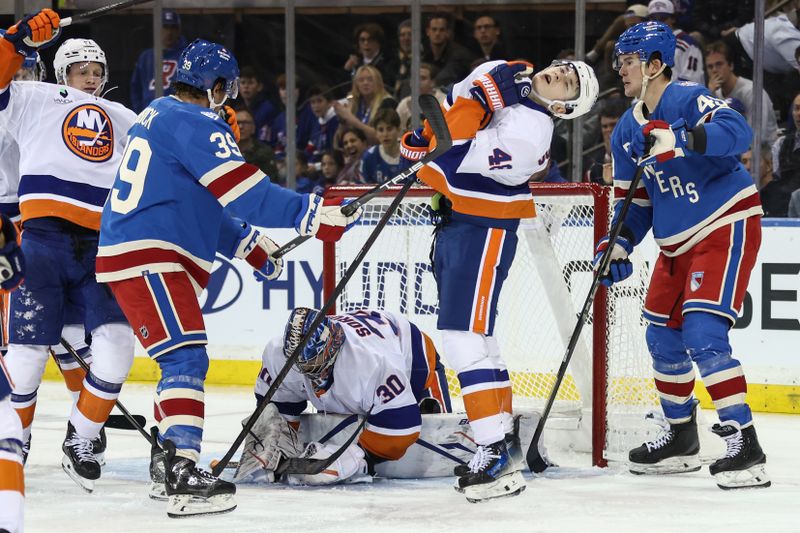 Nov 8, 2025; New York, New York, USA;  New York Islanders defenseman Matthew Schaefer (48) reacts after getting hit with New York Rangers center Sam Carrick’s (39) stick in the third period at Madison Square Garden. Mandatory Credit: Wendell Cruz-Imagn Images
