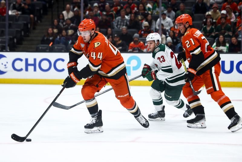 Nov 8, 2024; Anaheim, California, USA; Anaheim Ducks left wing Ross Johnston (44) skates with the puck during the third period of a hockey game against the Minnesota Wild at Honda Center. Mandatory Credit: Jessica Alcheh-Imagn Images