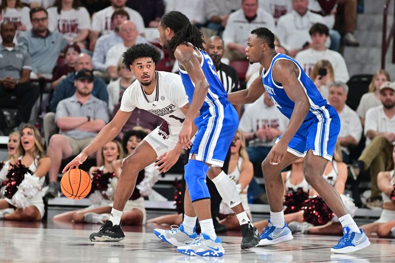 Feb 15, 2023; Starkville, Mississippi, USA; Mississippi State Bulldogs forward Tolu Smith (1) is defended by Kentucky Wildcats guard Cason Wallace (22) and forward Oscar Tshiebwe (34) during the first half at Humphrey Coliseum. Mandatory Credit: Matt Bush-USA TODAY Sports