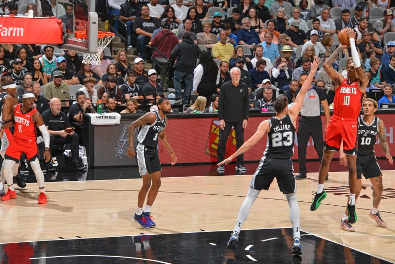 SAN ANTONIO, TX - MARCH 12: Jabari Smith Jr. #10 of the Houston Rockets shoots the ball during the game against the San Antonio Spurs on March 12, 2024 at the Frost Bank Center in San Antonio, Texas. NOTE TO USER: User expressly acknowledges and agrees that, by downloading and or using this photograph, user is consenting to the terms and conditions of the Getty Images License Agreement. Mandatory Copyright Notice: Copyright 2024 NBAE (Photos by Jesse D. Garrabrant/NBAE via Getty Images)