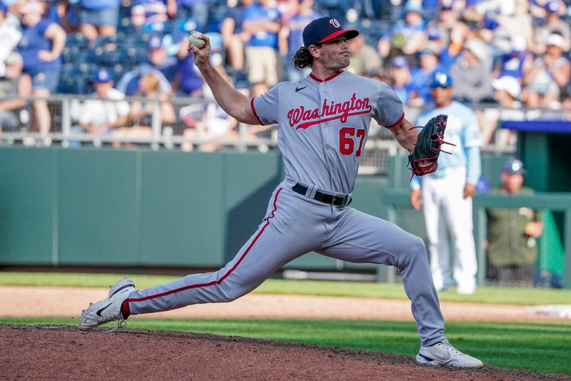 May 27, 2023; Kansas City, Missouri, USA; Washington Nationals relief pitcher Kyle Finnegan (67) delivers against the Kansas City Royals in the ninth inning at Kauffman Stadium. Mandatory Credit: Denny Medley-USA TODAY Sports