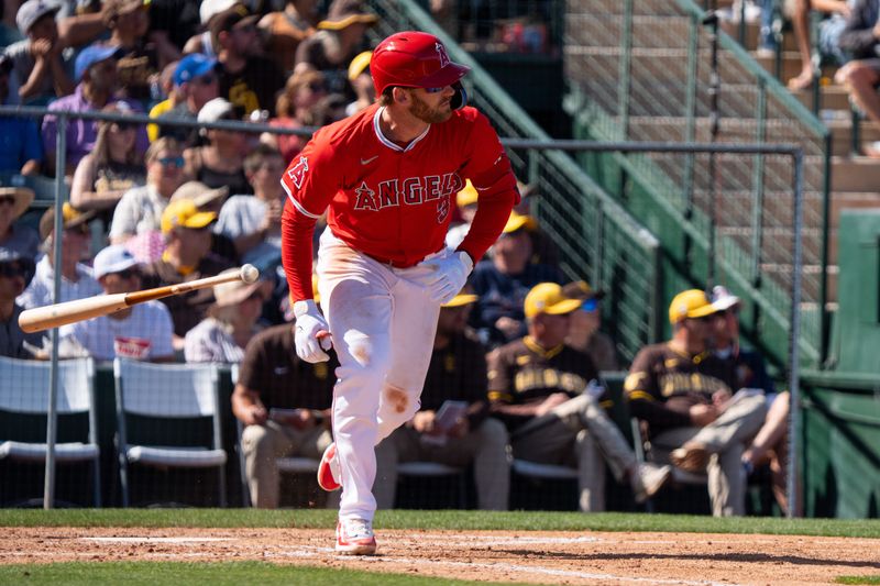 Mar 10, 2024; Tempe, Arizona, USA; Los Angeles Angels outfielder Taylor Ward (3) runs to first after a single in the sixth during a spring training game against the San Diego Padres at Tempe Diablo Stadium. Mandatory Credit: Allan Henry-USA TODAY Sports