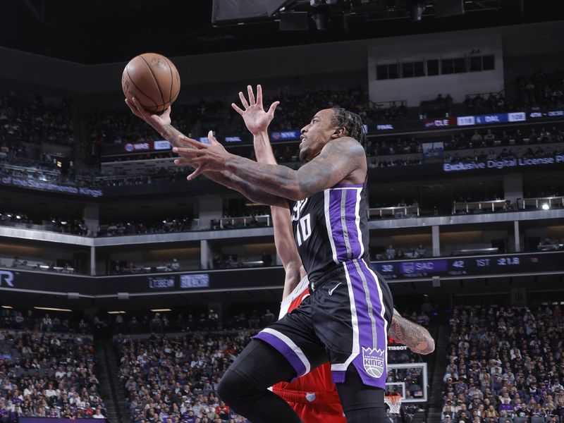 SACRAMENTO, CA - JANUARY 3: DeMar DeRozan #10 of the Sacramento Kings drives to the basket during the game against the Memphis Grizzlies on January 3, 2025 at Golden 1 Center in Sacramento, California. NOTE TO USER: User expressly acknowledges and agrees that, by downloading and or using this Photograph, user is consenting to the terms and conditions of the Getty Images License Agreement. Mandatory Copyright Notice: Copyright 2025 NBAE (Photo by Rocky Widner/NBAE via Getty Images)