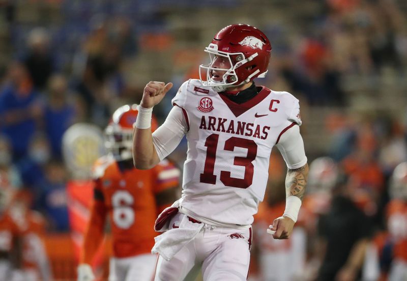 Nov 14, 2020; Gainesville, FL, USA;   Arkansas Razorbacks quarterback Feleipe Franks (13) reacts against the Florida Gators at Ben Hill Griffin Stadium. Mandatory Credit: Courtney Culbreath/Handout Photo via USA TODAY Sports