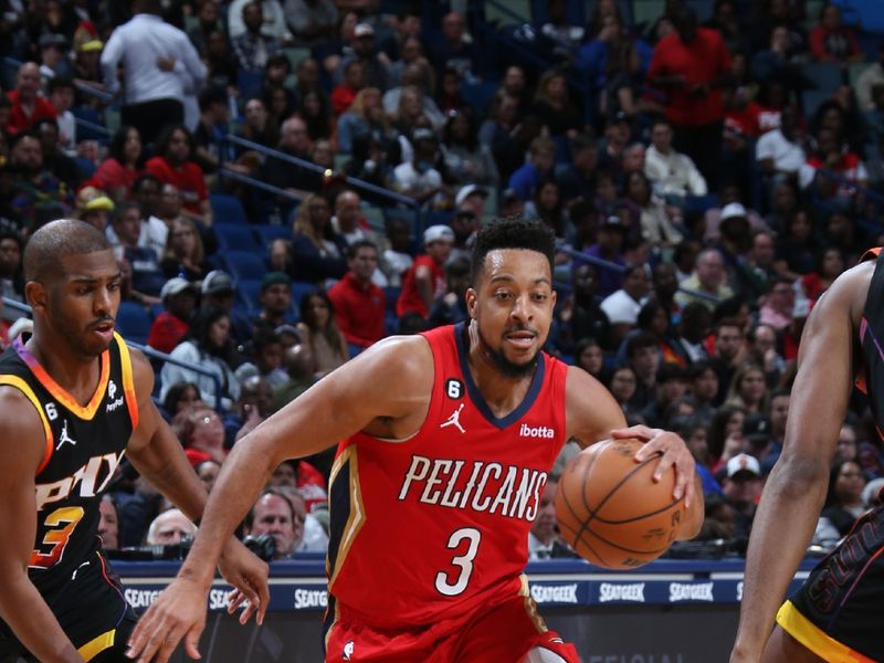 NEW ORLEANS, LA - DECEMBER 9: CJ McCollum #3 of the New Orleans Pelicans drives to the basket against the Phoenix Suns on December 9, 2022 at the Smoothie King Center in New Orleans, Louisiana. NOTE TO USER: User expressly acknowledges and agrees that, by downloading and or using this Photograph, user is consenting to the terms and conditions of the Getty Images License Agreement. Mandatory Copyright Notice: Copyright 2022 NBAE (Photo by Layne Murdoch Jr./NBAE via Getty Images)