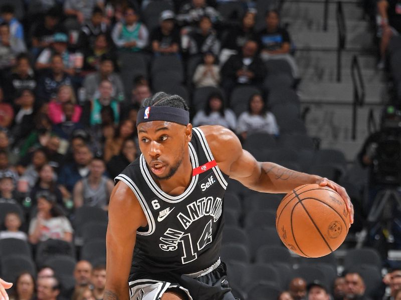 SAN ANTONIO, TX - MARCH 14: Blake Wesley #14 of the San Antonio Spurs dribbles the ball during the game against the Orlando Magic on March 14, 2023 at the AT&T Center in San Antonio, Texas. NOTE TO USER: User expressly acknowledges and agrees that, by downloading and or using this photograph, user is consenting to the terms and conditions of the Getty Images License Agreement. Mandatory Copyright Notice: Copyright 2023 NBAE (Photos by Michael Gonzales/NBAE via Getty Images)