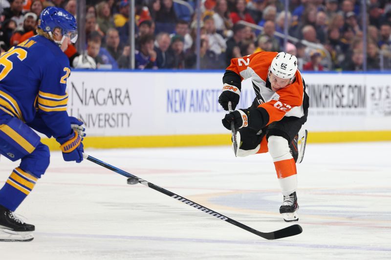 Apr 5, 2024; Buffalo, New York, USA;  Buffalo Sabres defenseman Rasmus Dahlin (26) tries to block a shot by Philadelphia Flyers right wing Olle Lycksell (62) during the first period at KeyBank Center. Mandatory Credit: Timothy T. Ludwig-USA TODAY Sports