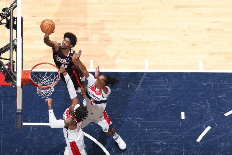 WASHINGTON, DC -? FEBRUARY 26: Scoot Henderson #00 of the Portland Trail Blazers drives to the basket during the game against the Washington Wizards on February 26, 2025 at Capital One Arena in Washington, DC. NOTE TO USER: User expressly acknowledges and agrees that, by downloading and or using this Photograph, user is consenting to the terms and conditions of the Getty Images License Agreement. Mandatory Copyright Notice: Copyright 2025 NBAE (Photo by Stephen Gosling/NBAE via Getty Images)